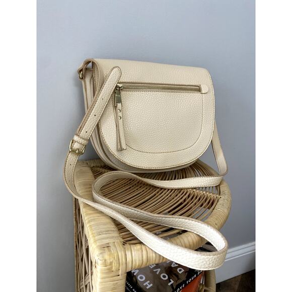 Earthtone Cream Pebbled Faux Leather Crossbody SaddleBag - Picture 2 of 13